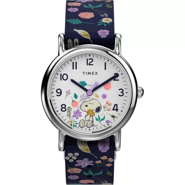 Timex Womens Watch Peanuts Weekender Casual Ladies Wristwatch  Featuring Snoopy and Woodstock in a Floral Motif SilverTone Case with Blue Fabric Strap 31mm