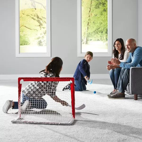 Franklin Sports NHL Kids Mini Hockey Set  Includes 1 Knee Hockey Goal  2 Mini Hockey Sticks  2 Foam Balls  Indoor Toy Mini Hockey Goal  Sticks SetRed