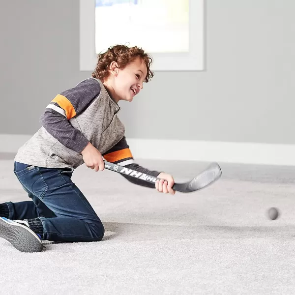 Franklin Sports Mini Hockey Stick and Ball Set  Play Knee Hockey Anytime  Kids Knee Hockey Set  Includes 2 Mini Sticks and 2 Foam Balls  NHL