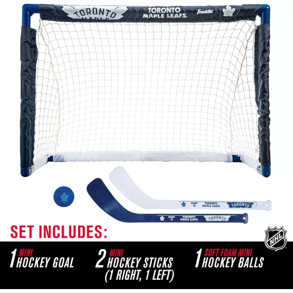 Franklin Sports NHL Mini Hockey Set  Kids Indoor Knee Hockey Goal Ball  2 Mini Hockey Stick Combo Set  Youth NHL Team Indoor Toy Knee Hockey Sets  NHL Official  Ages 3Toronto Maple Leafs