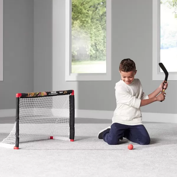 Franklin Sports NHL Mini Hockey Set  Kids Indoor Knee Hockey Goal Ball  2 Mini Hockey Stick Combo Set  Youth NHL Team Indoor Toy Knee Hockey Sets  NHL Official  Ages 3Chicago Blackhawks