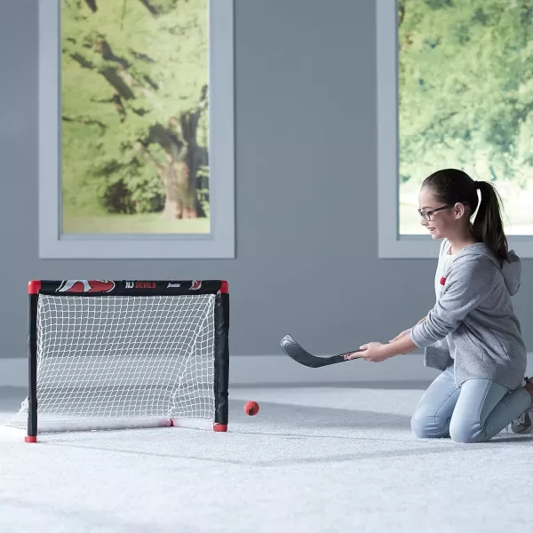 Franklin Sports NHL Mini Hockey Set  Kids Indoor Knee Hockey Goal Ball  2 Mini Hockey Stick Combo Set  Youth NHL Team Indoor Toy Knee Hockey Sets  NHL Official  Ages 3New Jersey Devils