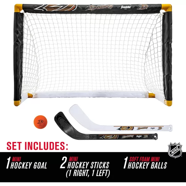 Franklin Sports NHL Mini Hockey Set  Kids Indoor Knee Hockey Goal Ball  2 Mini Hockey Stick Combo Set  Youth NHL Team Indoor Toy Knee Hockey Sets  NHL Official  Ages 3Anaheim Ducks