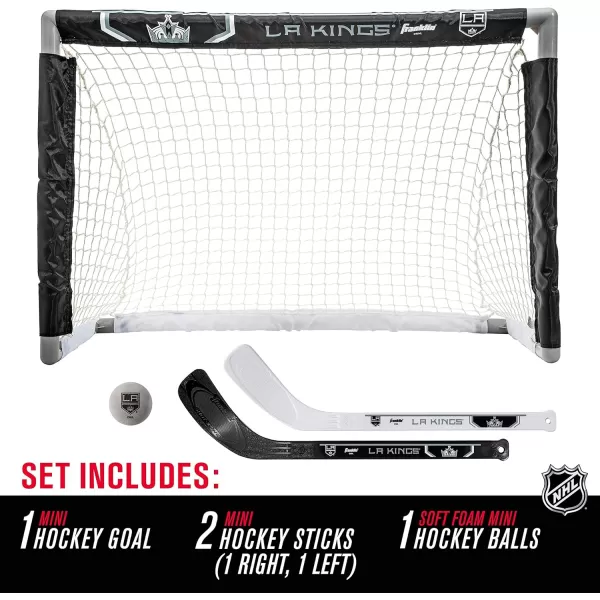Franklin Sports NHL Mini Hockey Set  Kids Indoor Knee Hockey Goal Ball  2 Mini Hockey Stick Combo Set  Youth NHL Team Indoor Toy Knee Hockey Sets  NHL Official  Ages 3Los Angeles Kings