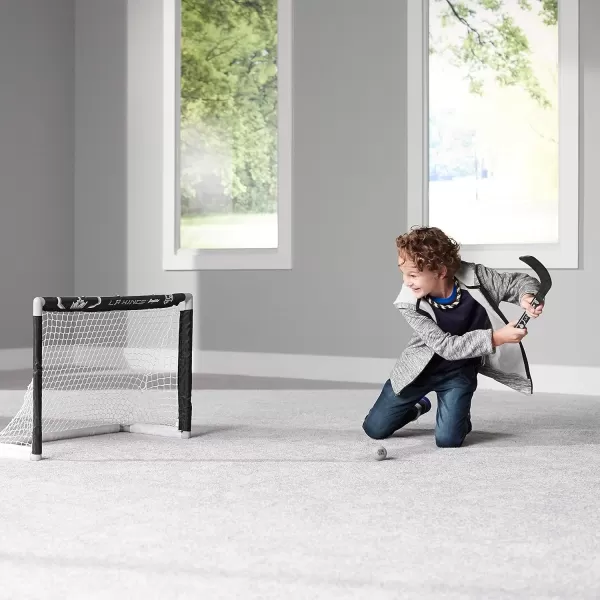 Franklin Sports NHL Mini Hockey Set  Kids Indoor Knee Hockey Goal Ball  2 Mini Hockey Stick Combo Set  Youth NHL Team Indoor Toy Knee Hockey Sets  NHL Official  Ages 3Los Angeles Kings