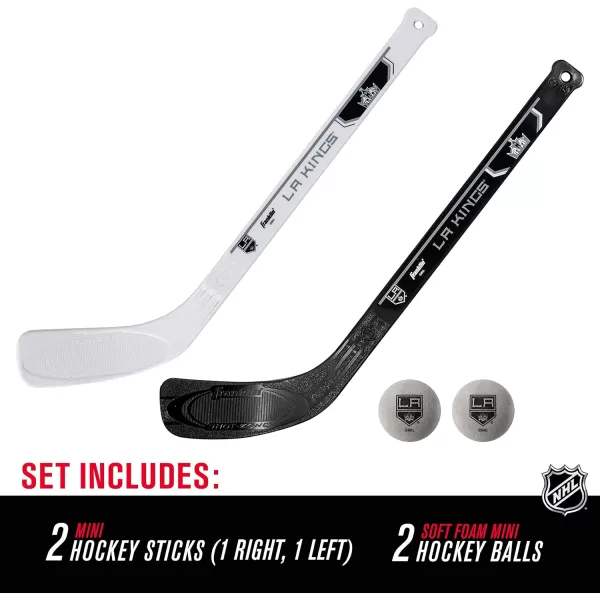 Franklin Sports NHL Mini Hockey Stick Set  NHL Team Knee Hockey Stick and Ball Set  Two Player Stick Set  Great Toy for KidsLos Angeles Kings