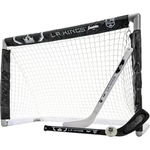 Franklin Sports NHL Mini Hockey Set  Kids Indoor Knee Hockey Goal Ball  2 Mini Hockey Stick Combo Set  Youth NHL Team Indoor Toy Knee Hockey Sets  NHL Official  Ages 3Los Angeles Kings