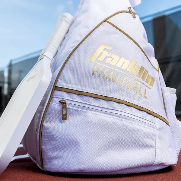 imageFranklin Sports Sling Bag Backpack for Pickleball Gear  Equipment  Holds Paddles Balls  Accessories  Official US Open Bag for Men  WomenWhiteGold