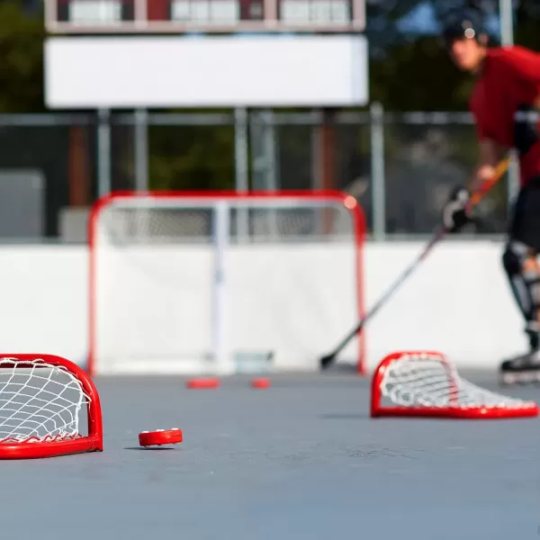 imageFranklin Sports NHL Street Roller Hockey Pucks  Pro Commander Outdoor Roller Hockey Pucks for Practice  Training  Outdoor Hockey Street Pucks with Rollers  24 Bulk Packs 6 Packs  Single PucksRed  Pack of 6
