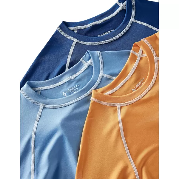 imageLiberty Pro 3 Pack Boys UPF 50 Rash Guard Long Sleeve Swim Shirts Quick Dry UV Protection Swimwear for KidsOrangeLight BlueMidnight Navy