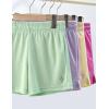 image4 Pack Girls Athletic Shorts with Pockets 3quot Dry Fit Running Shorts for Kids Teens Soccer BasketballGreenYellowLavenderPink