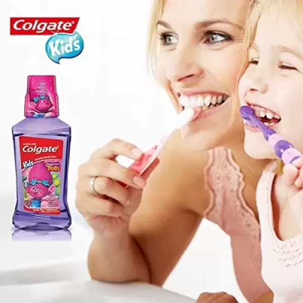 imageColgate Kids Mouthwash Unicorn Bubble Fruit Flavor Anticavity Fluoride Mouthwash 169 Ounce Pack of 6Trolls