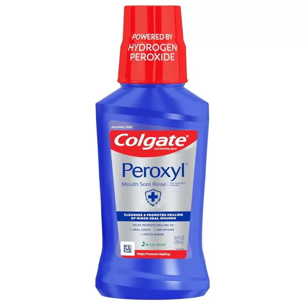 imageColgate Peroxyl Antiseptic Mouthwash and Mouth Sore Rinse 15 Hydrogen Peroxide Mild Mint  500ml 169 Fluid Ounces84 Fl Oz Pack of 1