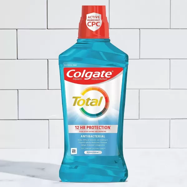 imageColgate Total Gum Health Alcohol Free Mouthwash Antibacterial Formula Helps Prevent Gingivitis Gum Disease Clean Mint  1L 338 fluid ounce 6 Pack338 Fl Oz Pack of 1