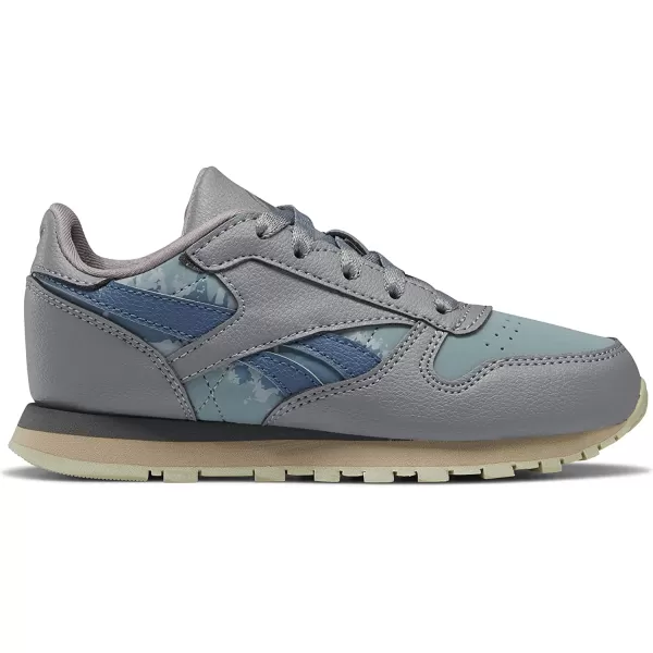 imageReebok Boys Classic Leather Sneaker Jurassic WorldGreyTeal FogBrave Blue 115 Little Kid