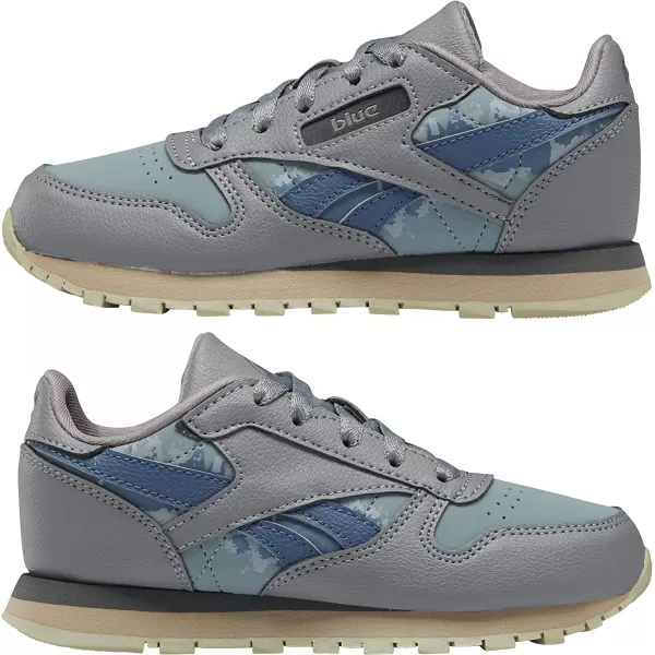 imageReebok Boys Classic Leather Sneaker Jurassic WorldGreyTeal FogBrave Blue 115 Little Kid