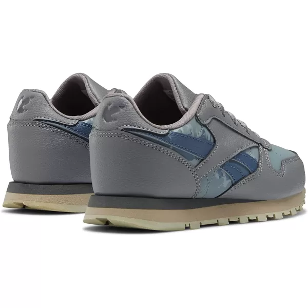 imageReebok Boys Classic Leather Sneaker Jurassic WorldGreyTeal FogBrave Blue 115 Little Kid