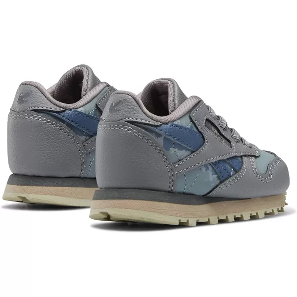 imageReebok Classic Leather Sneaker for UnisexChild Jurassic WorldGreyTeal FogBrave Blue