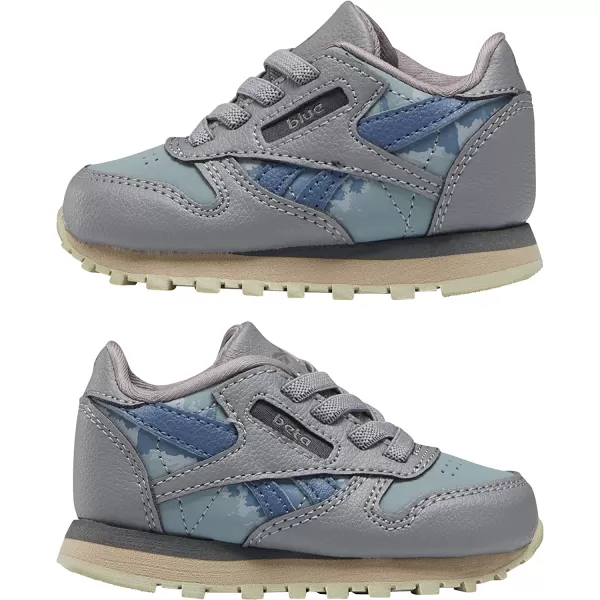 imageReebok Classic Leather Sneaker for UnisexChild Jurassic WorldGreyTeal FogBrave Blue