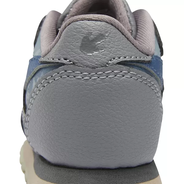 imageReebok Classic Leather Sneaker for UnisexChild Jurassic WorldGreyTeal FogBrave Blue
