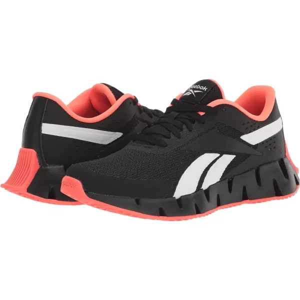 imageReebok Girls Zig Dynamica 20 Big KidBlackOrange FlareWhite