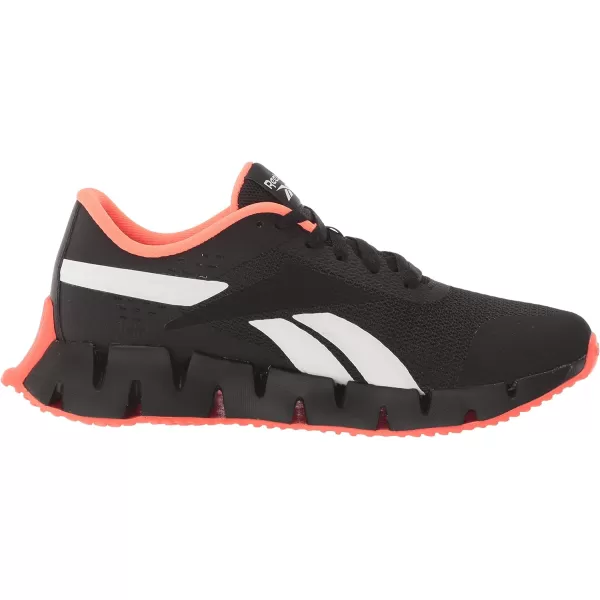 imageReebok Girls Zig Dynamica 20 Big KidBlackOrange FlareWhite