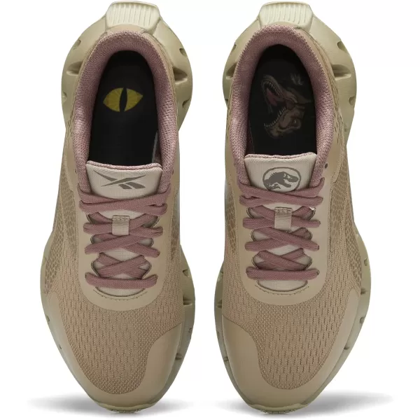 imageReebok Girls Zig Dynamica 20 Big KidJurassic WorldSand BeigeTaupe