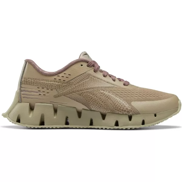 imageReebok Girls Zig Dynamica 20 Big KidJurassic WorldSand BeigeTaupe
