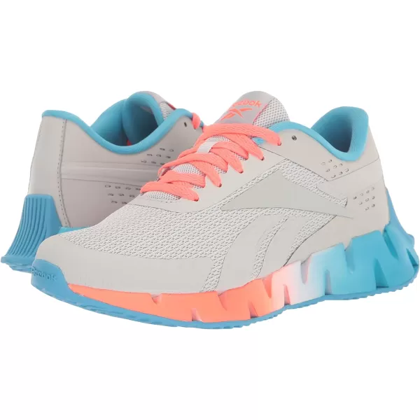 imageReebok Girls Zig Dynamica 20 Big KidPure GreyOrgflaRadiant Aqua