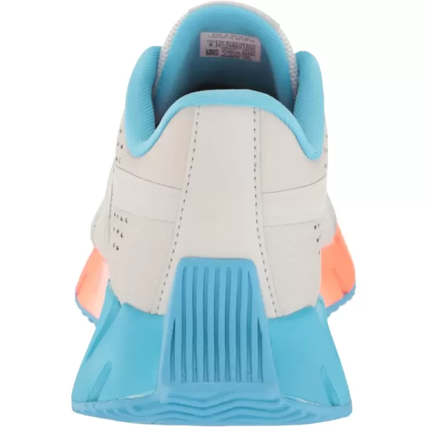 imageReebok Girls Zig Dynamica 20 Big KidPure GreyOrgflaRadiant Aqua