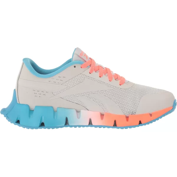 imageReebok Girls Zig Dynamica 20 Big KidPure GreyOrgflaRadiant Aqua