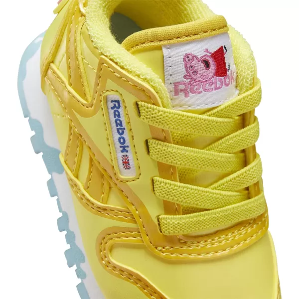 imageReebok Kids Classic Leather Sneaker in Peppa Pig YellowBrave BlueWhite
