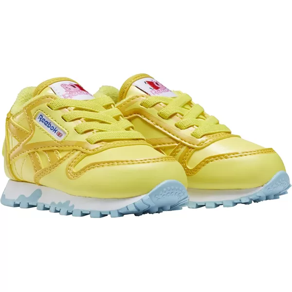 imageReebok Kids Classic Leather Sneaker in Peppa Pig YellowBrave BlueWhite