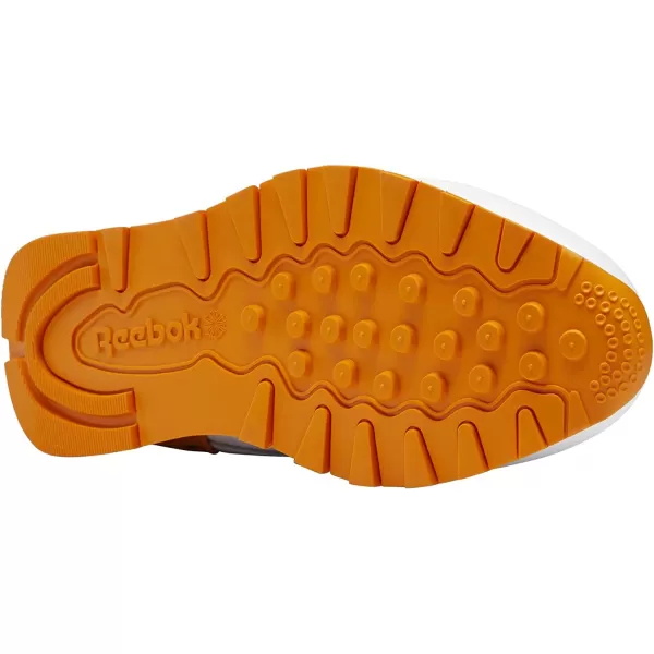 imageReebok Mens Classic Leather SneakerJetsonsFlintstonesGolden HorizonYellow