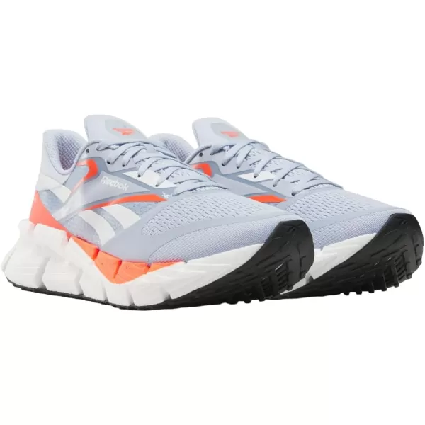 imageReebok Mens Floatzig 1 SneakerPale BlueFootwear WhiteOrange Flare