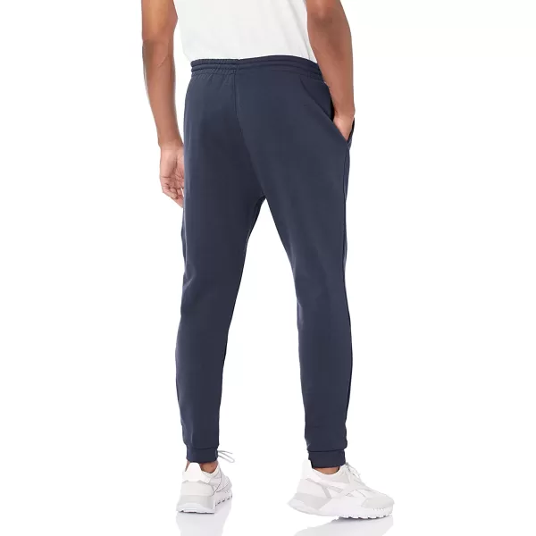 imageReebok Mens Identity JoggersNavy BlueGradient Blue Vector Logo