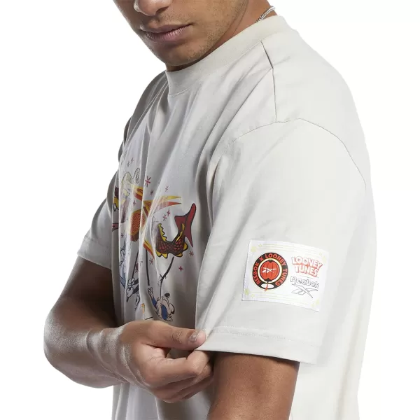 imageReebok Mens Standard Graphic TeeStucco BeigeLooney Tunes Graphic