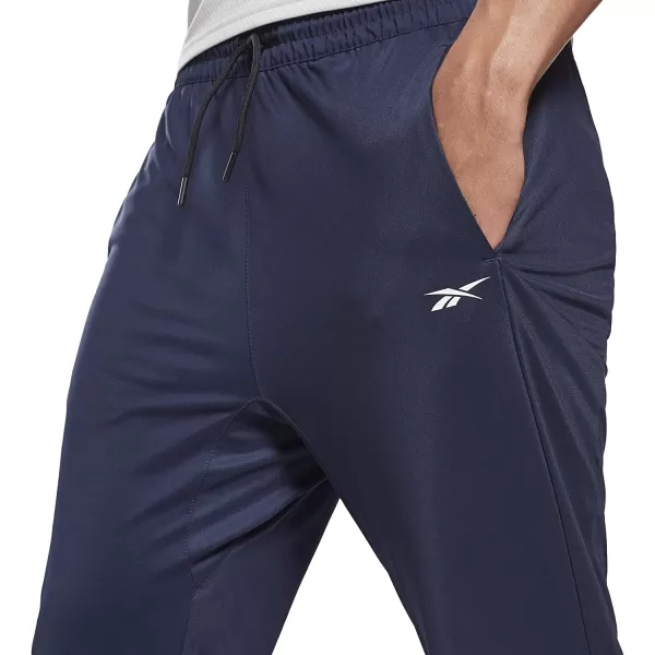 imageReebok Mens Standard Workout Ready Knit PantVector Navy