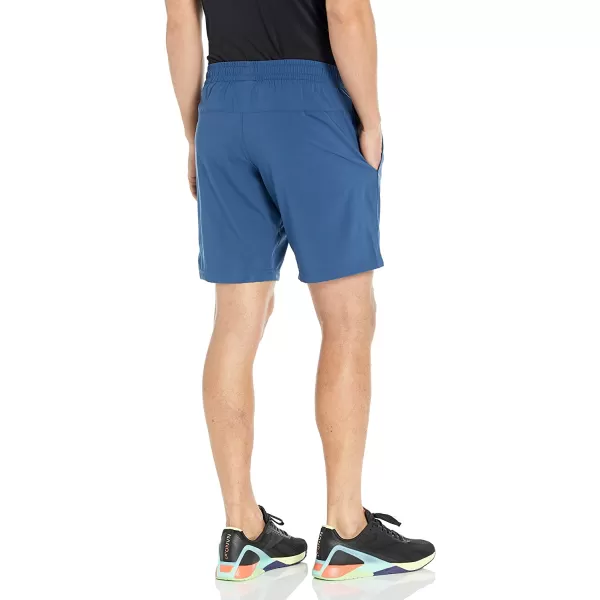 imageReebok Mens Standard Workout Ready Woven ShortsBatik BlueWhite Small Logo
