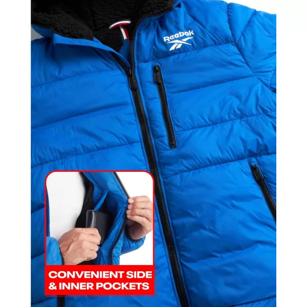 imageReebok Mens Winter Jacket  Heavyweight Quilted Puffer Parka Coat  Ski Jacket for Men Sherpa Lined Hood SXLVector Blue