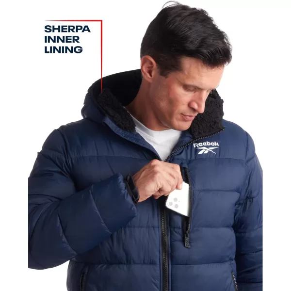 imageReebok Mens Winter Jacket  Heavyweight Quilted Puffer Parka Coat  Ski Jacket for Men Sherpa Lined Hood SXLVector Navy