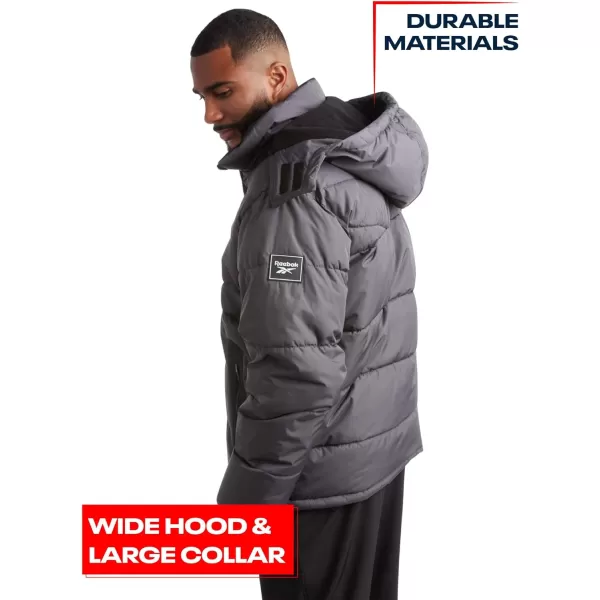 imageReebok Mens Winter Jacket  Heavyweight Quilted Puffer Parka Coat  Weather Resistant Jacket for Men LXXLCharcoal
