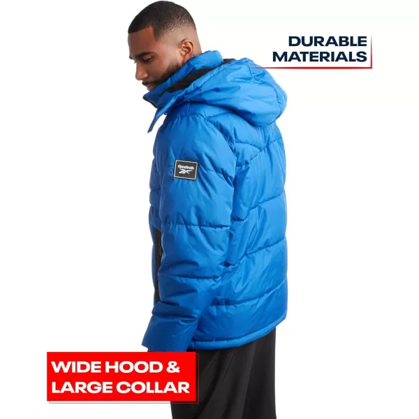 imageReebok Mens Winter Jacket  Heavyweight Quilted Puffer Parka Coat  Weather Resistant Jacket for Men LXXLVector Blue