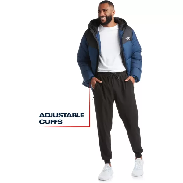 imageReebok Mens Winter Jacket  Heavyweight Quilted Puffer Parka Coat  Weather Resistant Ski Jacket for Men 820BlackNothern Night