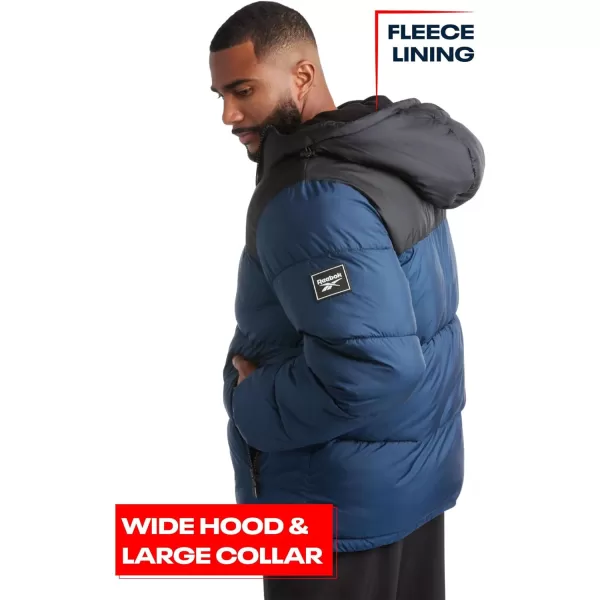 imageReebok Mens Winter Jacket  Heavyweight Quilted Puffer Parka Coat  Weather Resistant Ski Jacket for Men 820BlackNothern Night