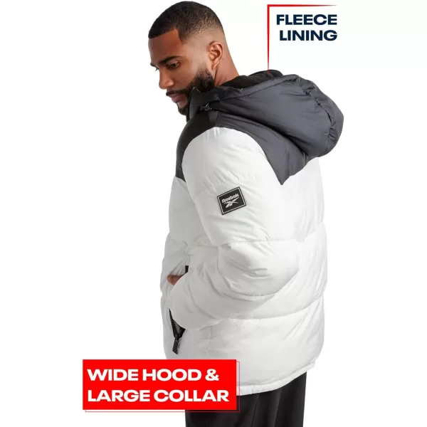 imageReebok Mens Winter Jacket  Heavyweight Quilted Puffer Parka Coat  Weather Resistant Ski Jacket for Men 820BlackWhite
