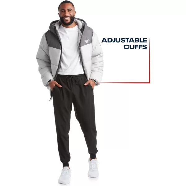 imageReebok Mens Winter Jacket  Heavyweight Quilted Puffer Parka Coat  Weather Resistant Ski Jacket for Men 820CharcoalGrey