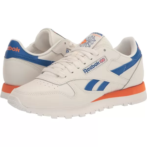 imageReebok Unisex Classic Leather SneakerChalkVector BlueSmash Orange