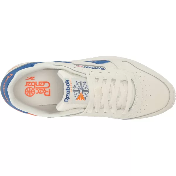 imageReebok Unisex Classic Leather SneakerChalkVector BlueSmash Orange