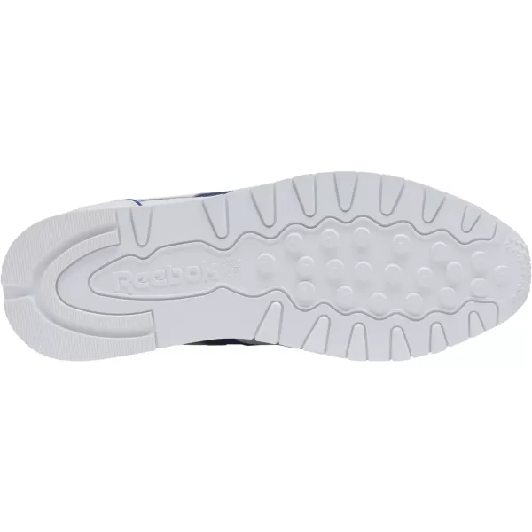 imageReebok Unisex Classic Leather SneakerChalkVector BlueVector Navy